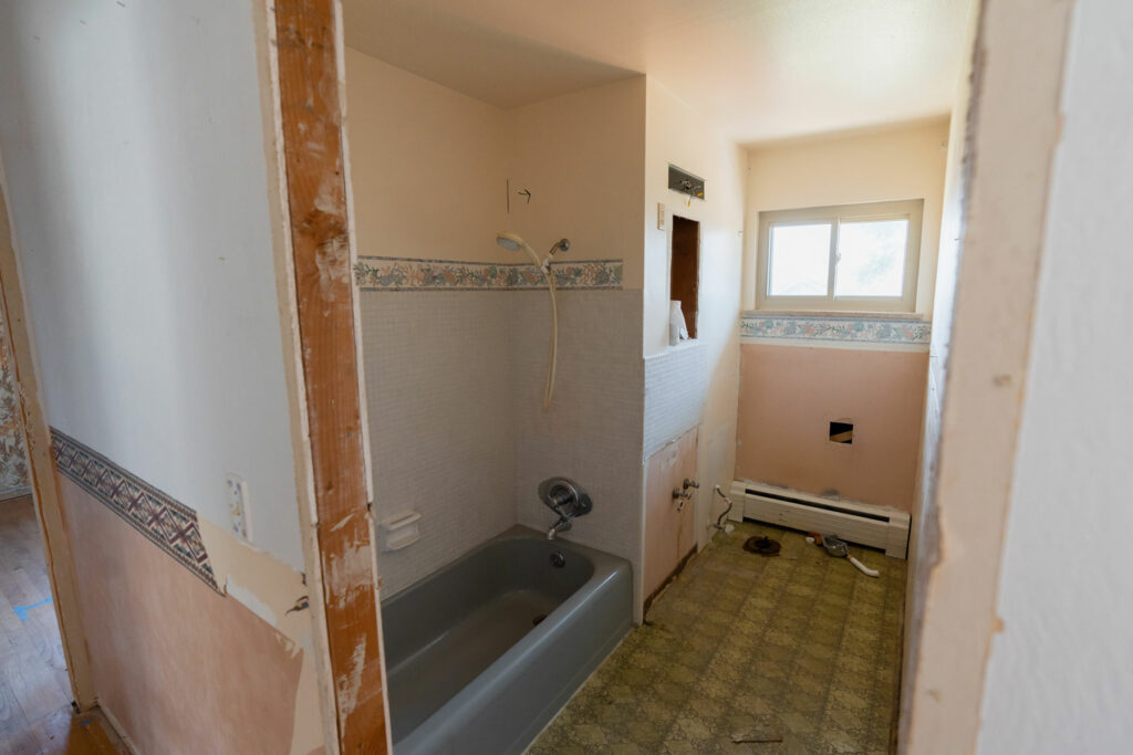 Old bathroom before a bathroom remodel, part of a complete home renovation project in Boulder, Colorado.